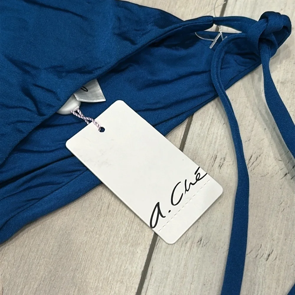 A. Che Jolie string ink blue swim bikini bottom size XS